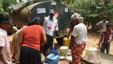 Distributing water to the drought affected in SE Sri Lanka