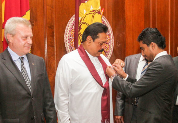 Commemorative flag in view of World Red Cross Day presented to President of Sri Lanka