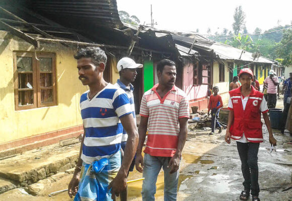 Volunteers respond to a home fire in Nuwara Eliya
